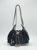 Divabags black grained calfskin Chanel 25 bucket bag with gold hardware and chain strap.