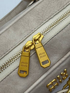 Miu Miu Mini Leather Handbag with Strap – Black
