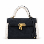 Hermès Mini Kelly μαύρη με λευκή επένδυση σε λευκό φόντο
