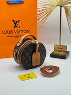 Louis Vuitton Mini Round Monogram με ταμπά λεπτομέρειες και ιμάντα — αρχική φωτογραφία
